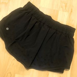 Size 10 Black Lulu skirt with shorts underneath.